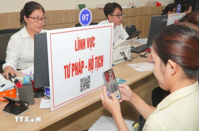 cb5ffe3df4d35d3629b74be8290f6c047e79a8a20638d02902ccf799d2f90d-_ttxvn-chinh-quyen-dia-phuong-hai-cap-thanh-pho-ho-chi-minh-2.jpg